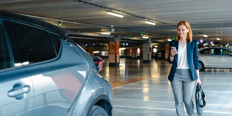 Business person in parking lot